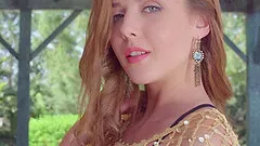 Alluring solo model shows off her shaved pink cunt close up