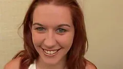 Doting redhead deepthroats a thick pecker in close up shoot