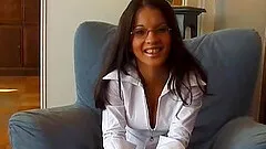 Amazing brunette in glasses sliding a see-through dildo up her cunt
