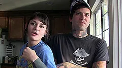 Tattooed naked scene chicks having fun behind the scenes