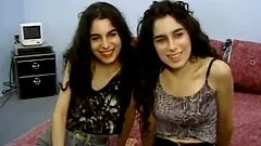 Two brunette bitches get naked and have a threesome with a man