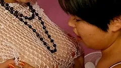 Lesbian cutie plats a strap on cock deep in her girlfriend's cunt doggy style