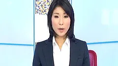 Newscaster reads her copy and strips to show her tits and cunt