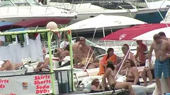 Brunette amateur with a big booty flashes her breasts on a boat
