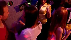 Drunk girls at a dance club strip down and eat pussy