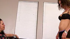 Curly-haired beauty pleasuring her pale girlfriend