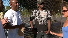 Wild slut with beautiful natural tits enjoying an interracial gangbang