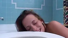Tattooed brunette with petite tits enjoying a hardcore fuck in her bathroom