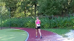 After a run the sporty babe masturbates in the locker room