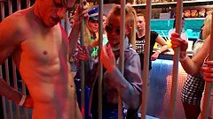 Lovely dames bend for rough doggystyle fucking in an orgy at the club