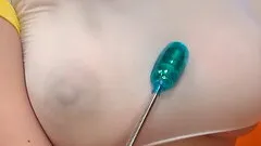 Lovely Japanese babe with big tits enjoys a cute vibrator tease as she lies on the couch