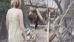 Out in the woods a couple films a hardcore video on a log