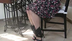 Lovely Mia massages her well manicured feet with a sewing machine