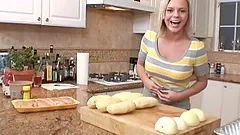 Bree Olson shows cleavage while cooking in her kitchen