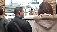 Japanese women tease man in public via handjob Subtitled