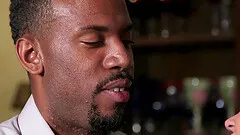 Sultry porn star with big boobs sucking a massive black cock