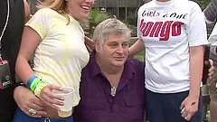 Cuddly amateurs in jeans and bikinis with piercing having fun outdoor as they get drunk