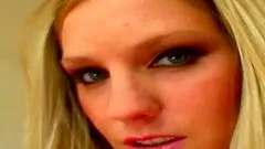 Teen blonde stripping and jamming a dildo up her cunt