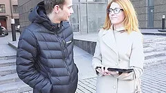 An amateur redhead in glasses bounces his dick as he sits in a chair