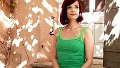 Pale redhead beauty pleasuring her juicy muff outside