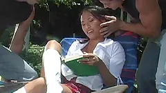 Brunette in uniform is seduced and nailed outdoor in threesome clip