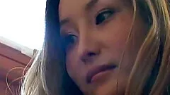 Charming Asian pornstar gets fucked by a big black cock hardcore