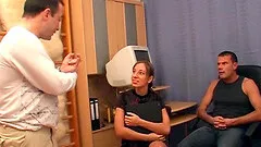 Girl in a satin dress has close up double penetration sex