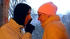 Girlfriend with glasses gives outdoor blowjob on a snowy day