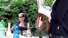 Outside party ends up with them spraying champagne all over