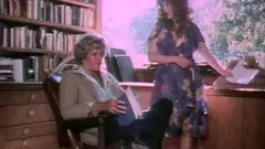 Wavy haired wife giving her hubby a blowjob in saucy retro action