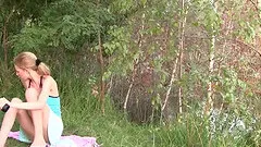 An utterly breathtaking teen body is naked by the lake