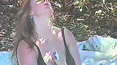 Horny MILF outside enjoys masturbation with beads insertion in cunt