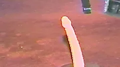 Amateur brunette mom plays with a dildo in retro homemade solo