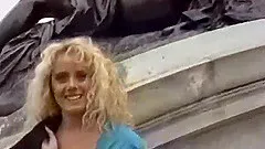 Smiley cougar is being screwed hardcore in a vintage bed sex clip