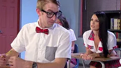 Ravishing brunette in a college girl uniform nailed hard