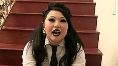 Punker girls hanging out and flashing while backstage