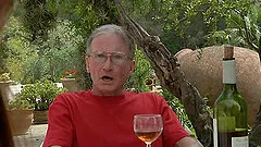 A sexy redhead gives an old guy a lap dance then bounces on his dick