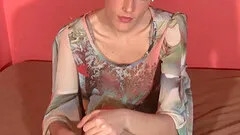 She strips out of her high heels, smokes a cigarette and plays with her feet