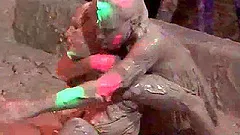 Lusty lesbians wrestling in mud at WAM party
