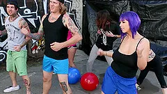 Purple haired babe with sexy curves fucks big black cock outdoors