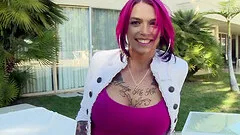 Tattooed punk with huge fake tits getting her pussy licked