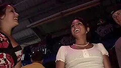 Mini-skirt clad chick with a nice ass flashing her tits at partygoers