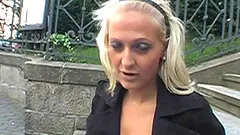 Upskirt flashing blonde is happy to suck a cock in public
