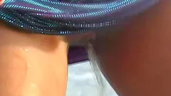 Solo model with big tits displaying her big nipples at the beach in reality shoot