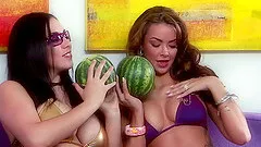 A couple of sexy lesbians have some hot, erotic fun with a dildo