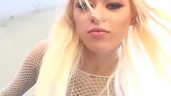 Blonde babe in fishnet gets her pussy thrilled while being anal toyed in close up