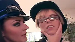 Porn stars in uniform giving a tasty cock blowjob in a FFM POV scene