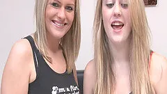 Two blond babes wearing thong show their massive tits for the cam