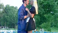Alluring blonde babe in maid uniform enjoys getting pounded hardcore outdoors