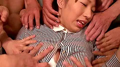 A Japanese girl gets gangbanged with multiple vibrators at once